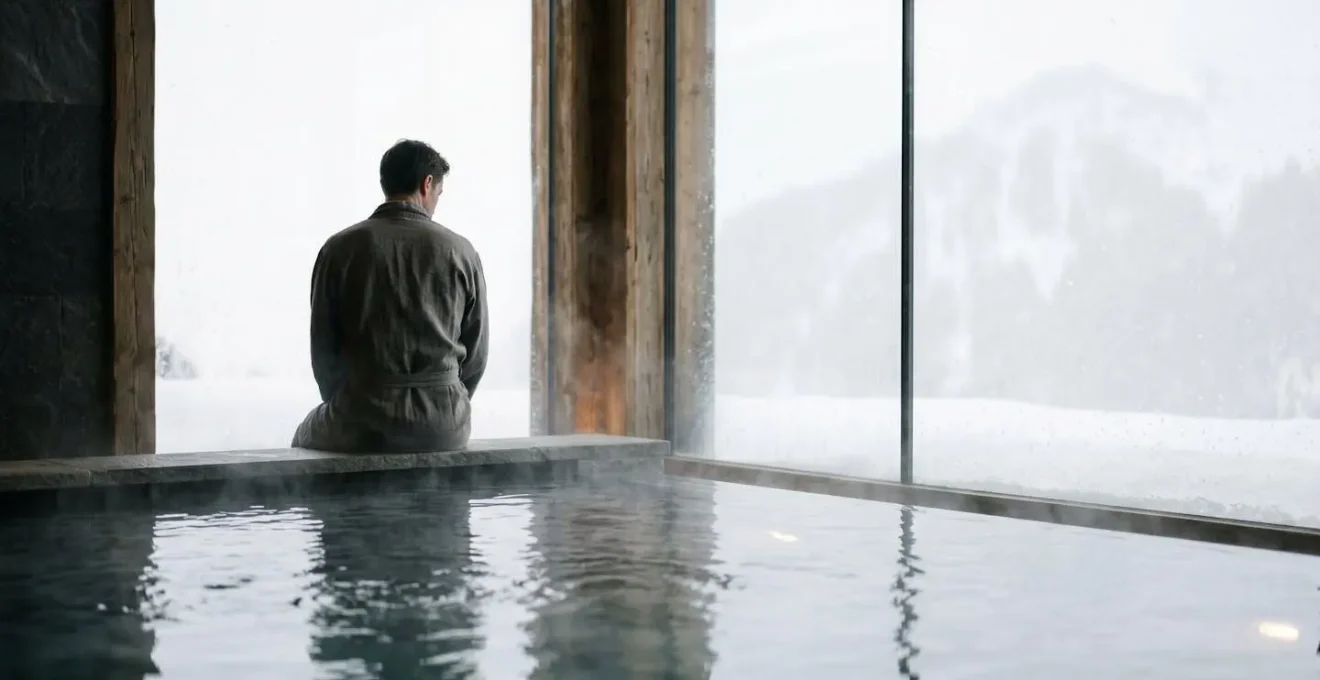 Espace spa privé avec bassin et vue panoramique sur la tempête de neige en montagne